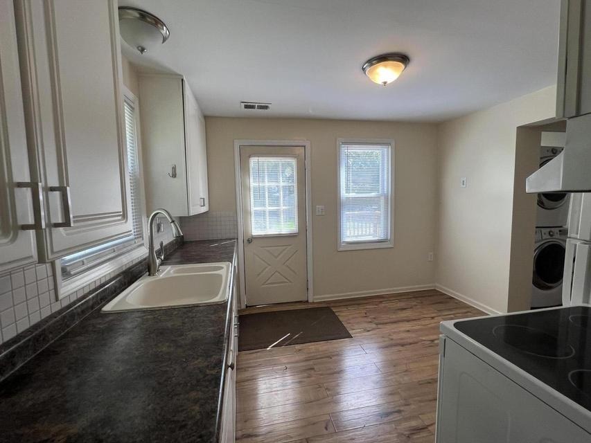 Kitchen with wood-plank ceiling